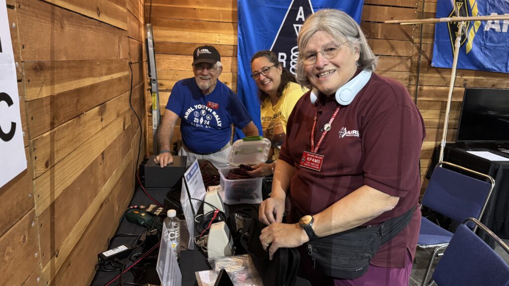 Neil - KL7HQR, Virginia - KK6USH, and Carol - KP4MD operating at the K6C State Fair Special Event Station